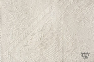 detail of a quilter's garden whole cloth quilt k vierra