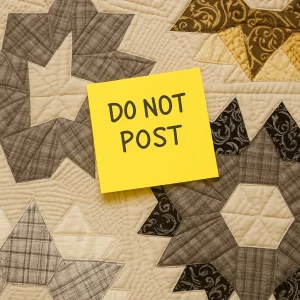 quilt with a do not post sticky note