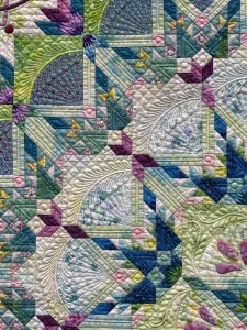 naomi ootomo peacock quilt detail houston quilt festival