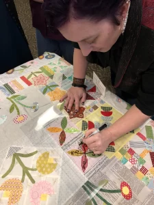 me auditioning quilt designs